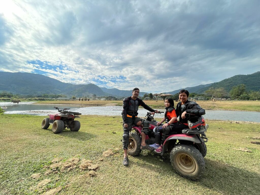 3 people with 2 atvs