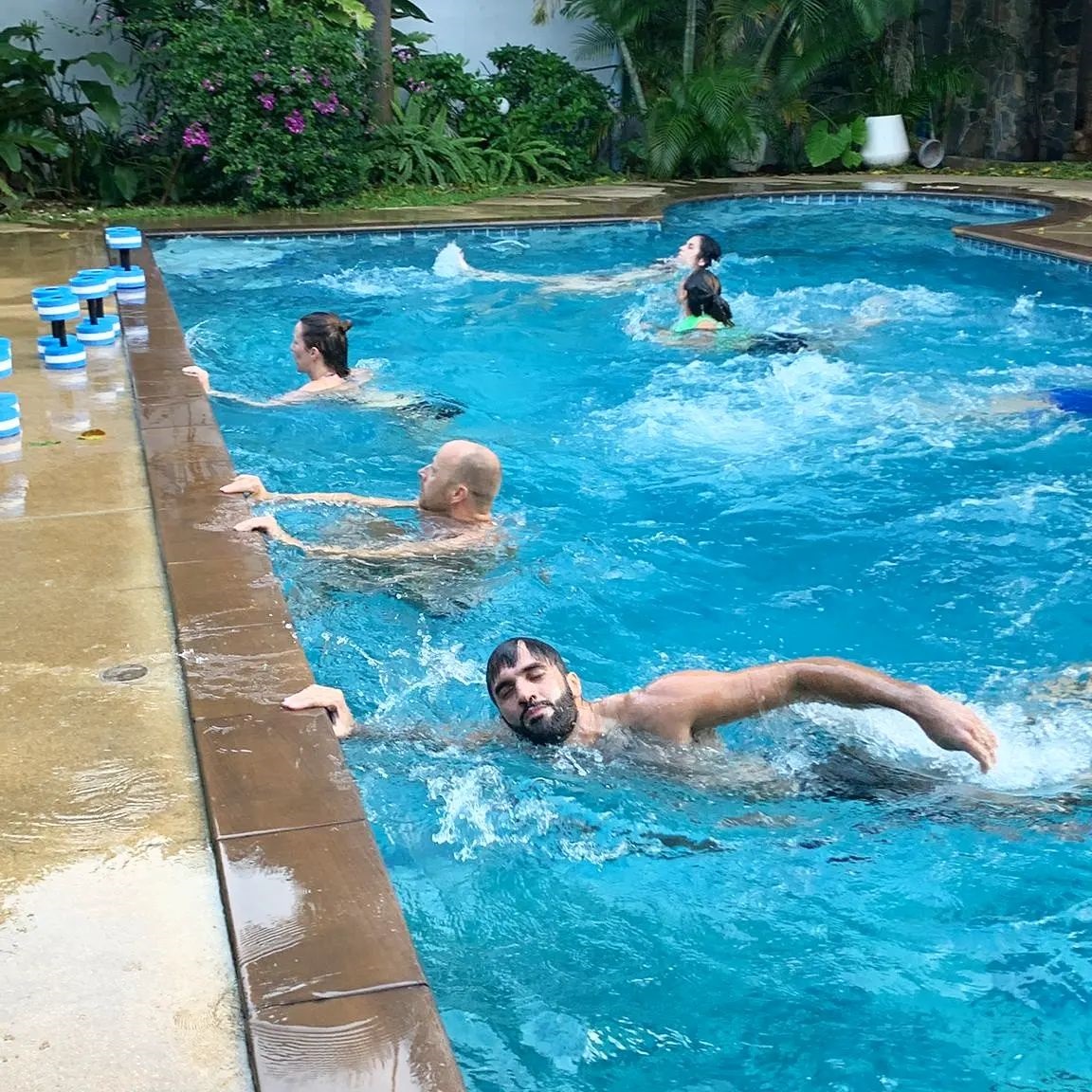 visit natural detox resort - swimming exercise