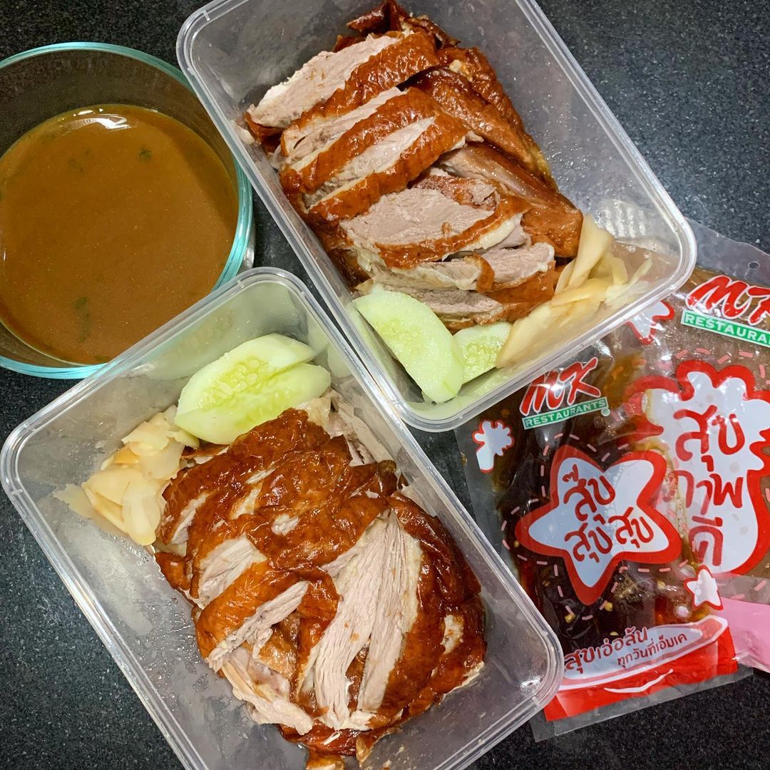 A boxed roast duck meal from MK restaurants similar to the one that the woman gifted the motorcycle taxi driver. 