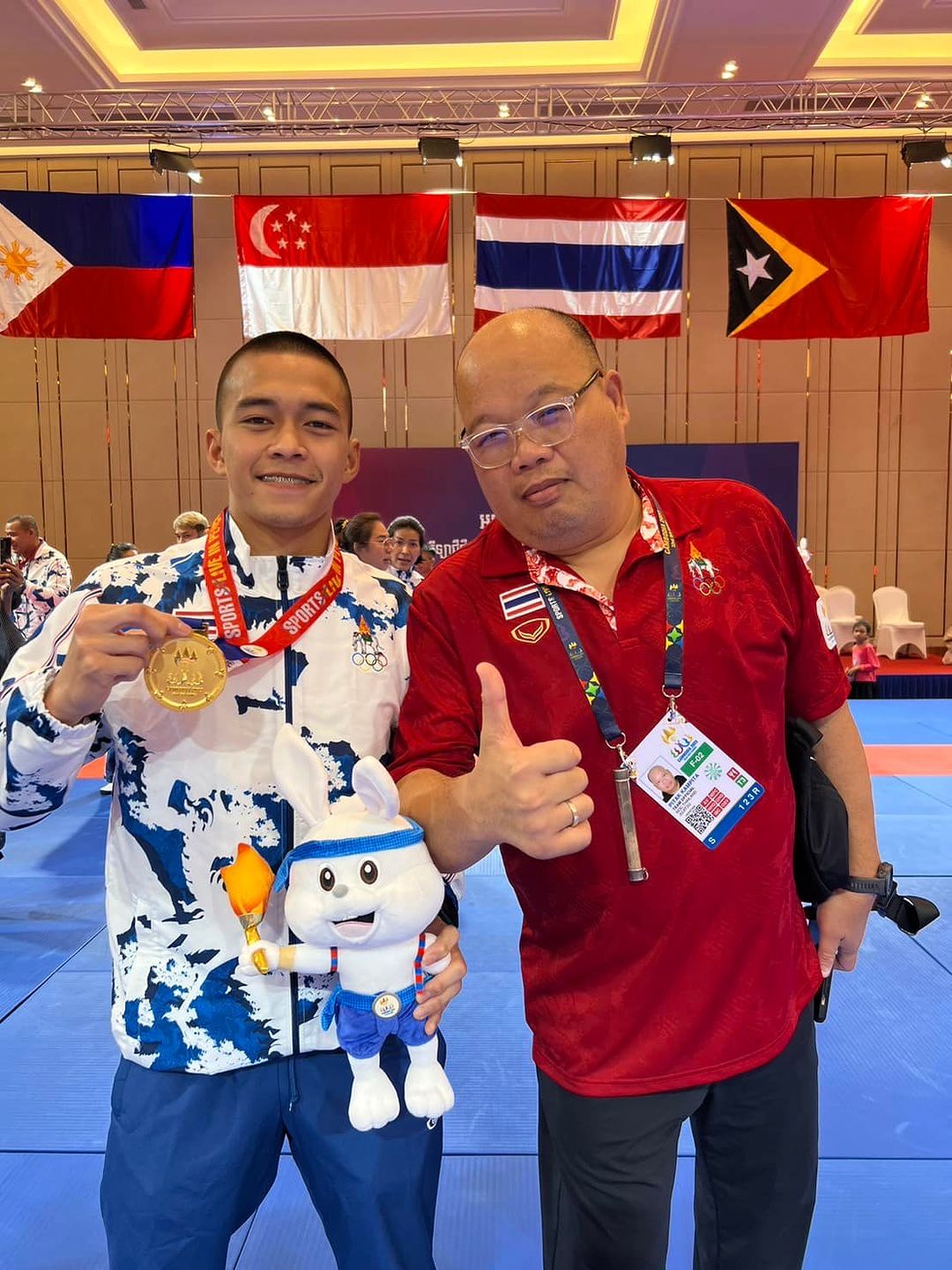 Thai jujitsu practitioner Suwijak Kuntong winning gold in Men's ne-waza gi 62 kg. 