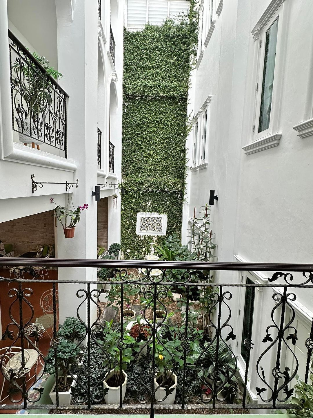 The garden view from a balcony inside the Casa Blanca Boutique Hotel