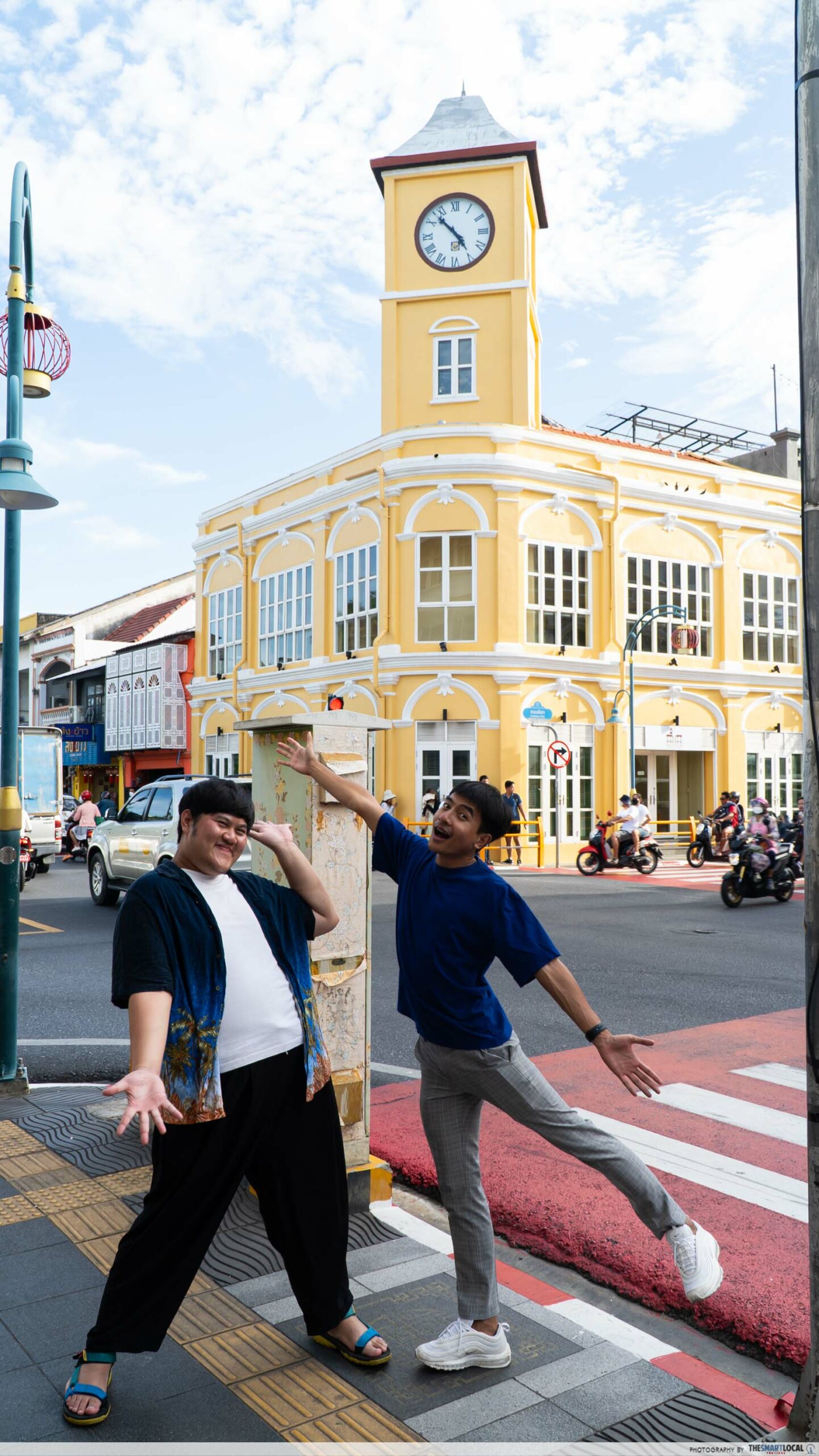 The TSL Thailand team posing with the Promthep Clock Tower, a landmark of Old Town Phuket in Southern Thailand.